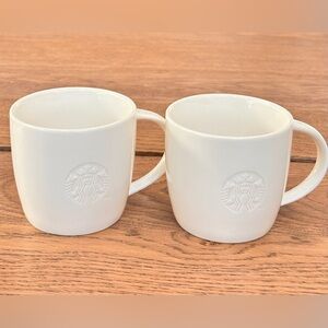 Starbucks 2010 Embossed Logo White Mugs Set of TWO 8 oz.